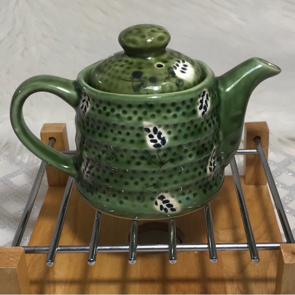 Vintage Decorative Teapot green with painted leaves.